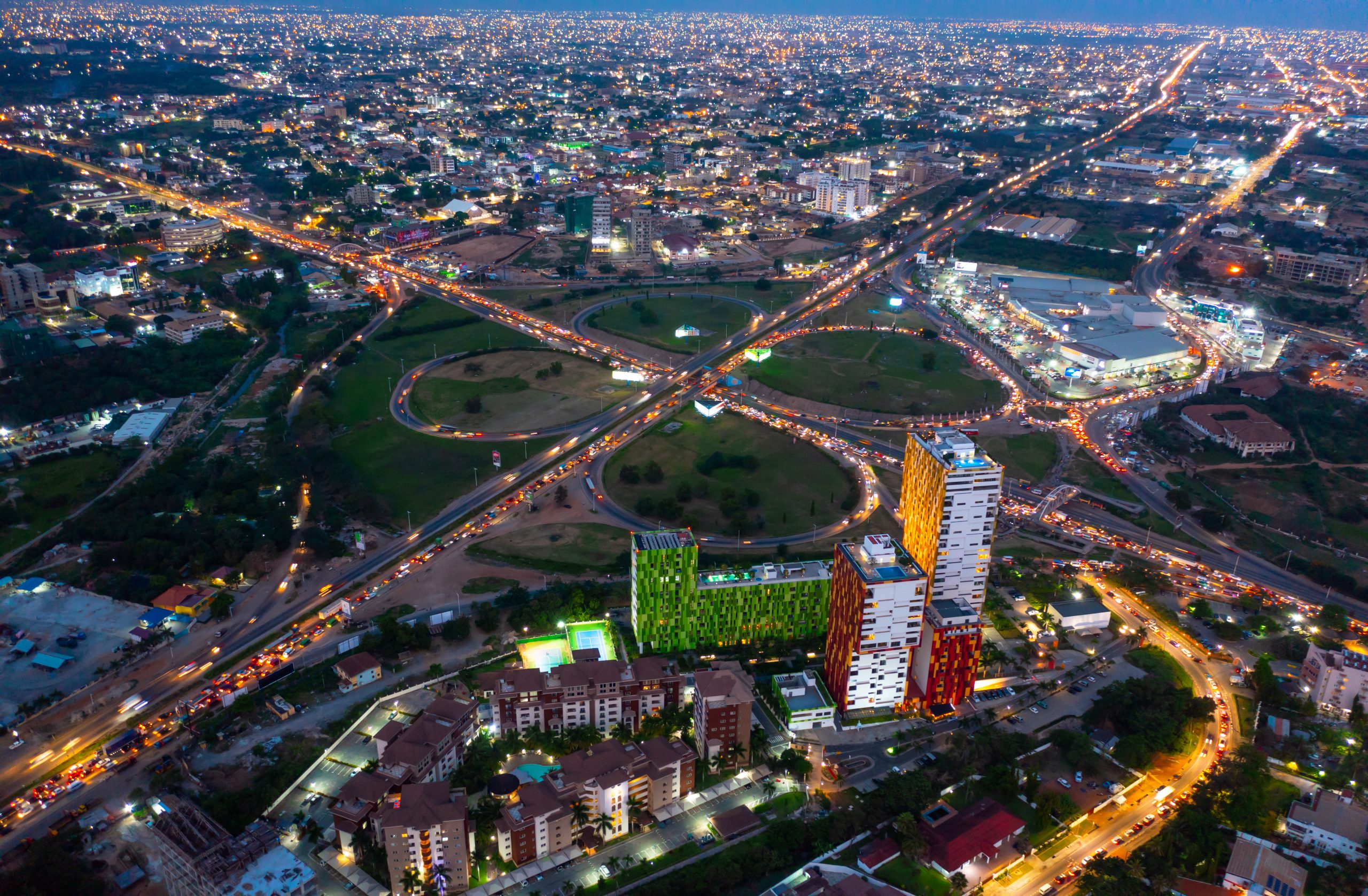 Thelo DB Project: Aerial shot of the city of Accra in Ghana at night